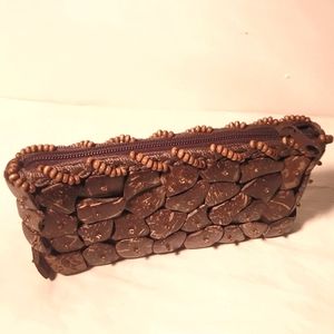 Coconut shell clutch 8" x 4"